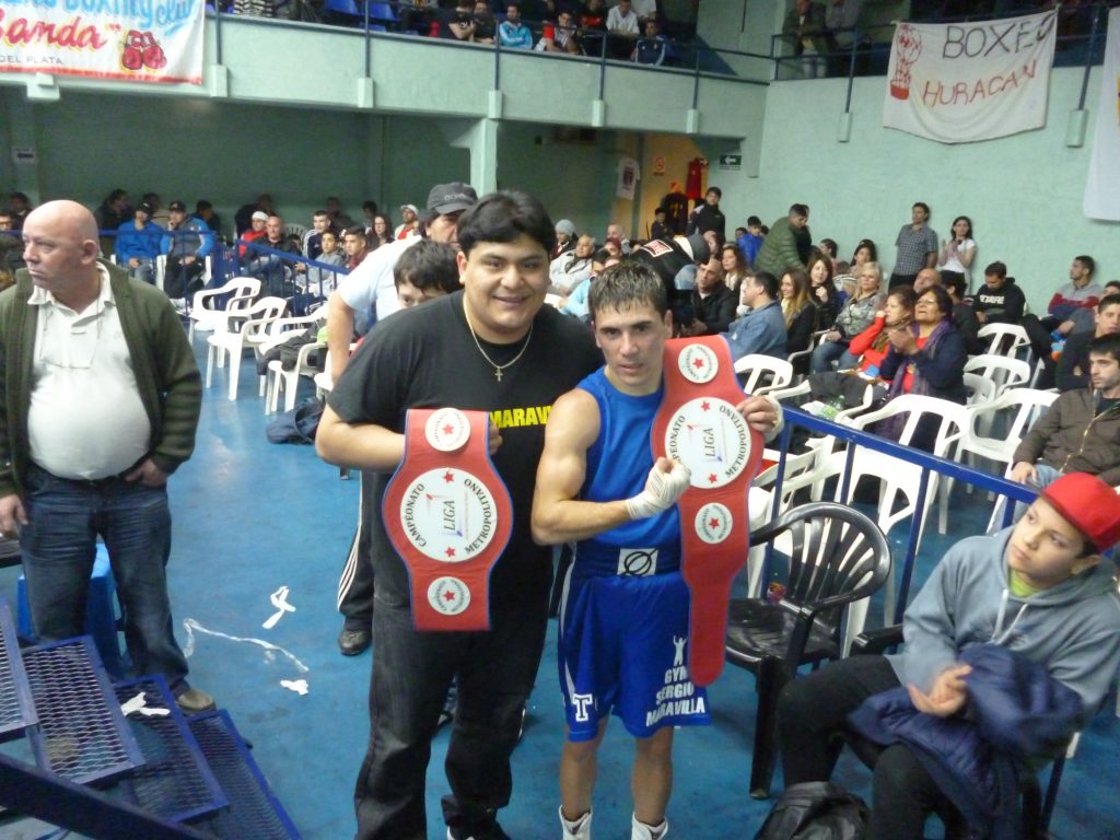 Calderón y Quiroga con sus cinturones. 