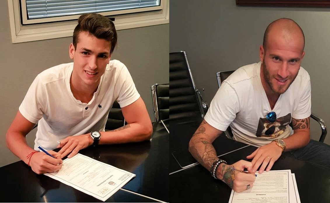 Juan Ignacio Dinenno y Cristian Llama firmando sus contratos. (Foto: Club Aldosivi)